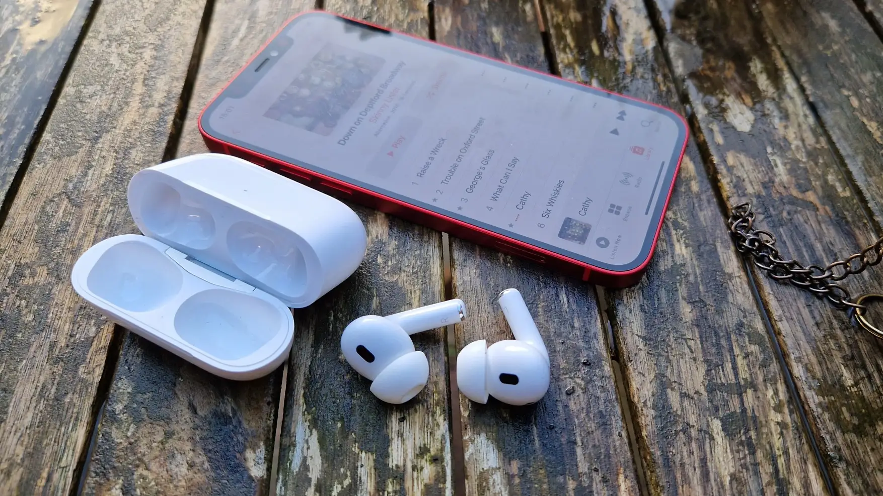 Apple AirPods Pro charging case with earbuds