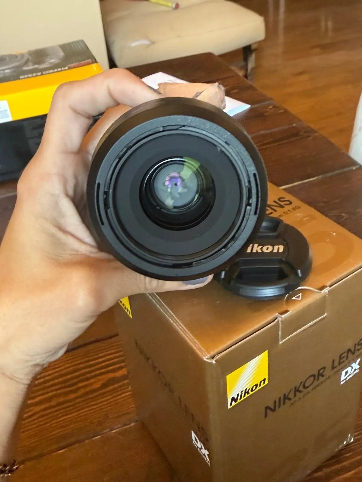 Nikon 35mm f/1.8G with accessories for resale