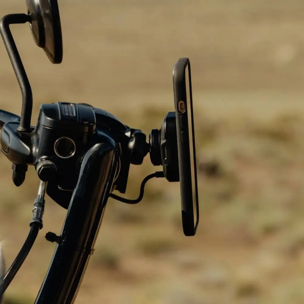 Peak Design motorcycle mount installed on handlebars
