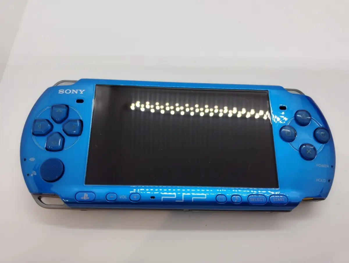 Sony PSP 3000 vibrant blue product shot with accessories