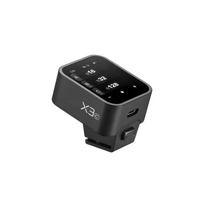 Godox X3C compact design in photographer's hand