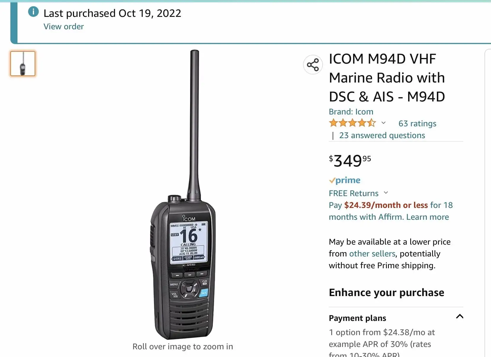 Icom M94D handheld radio with charger and accessories