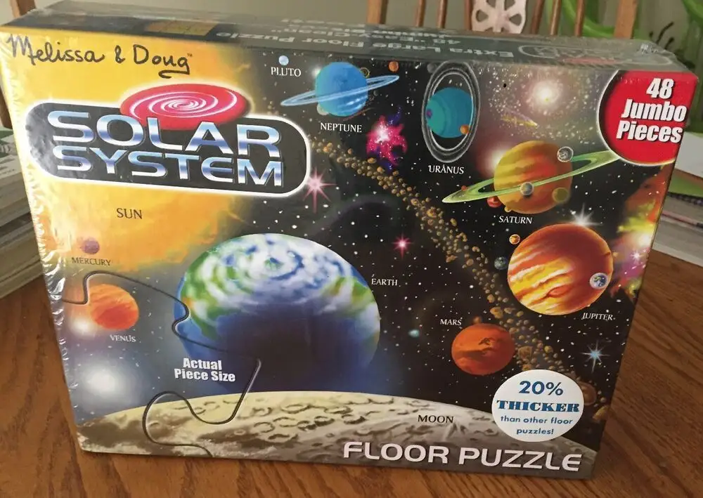 Melissa & Doug Solar System Floor Puzzle pieces and planet labels