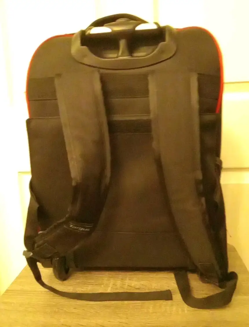 Targus Compact Rolling Backpack in travel commute setting
