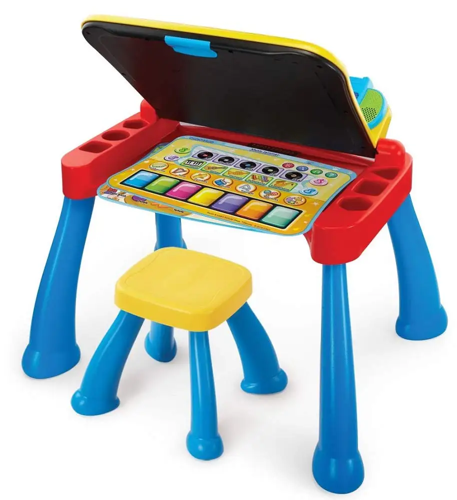 VTech Touch and Learn Activity Desk Deluxe toddler using desk