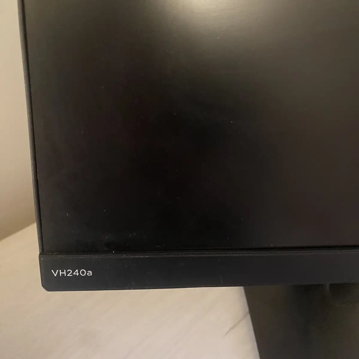 HP VH240a monitor side view showing ergonomic stand