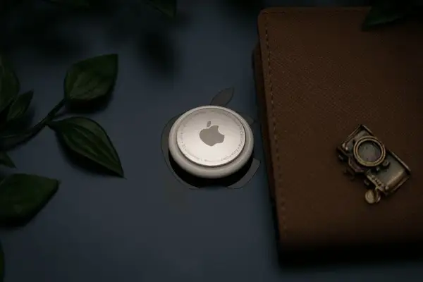 Apple AirTag product image showing compact design