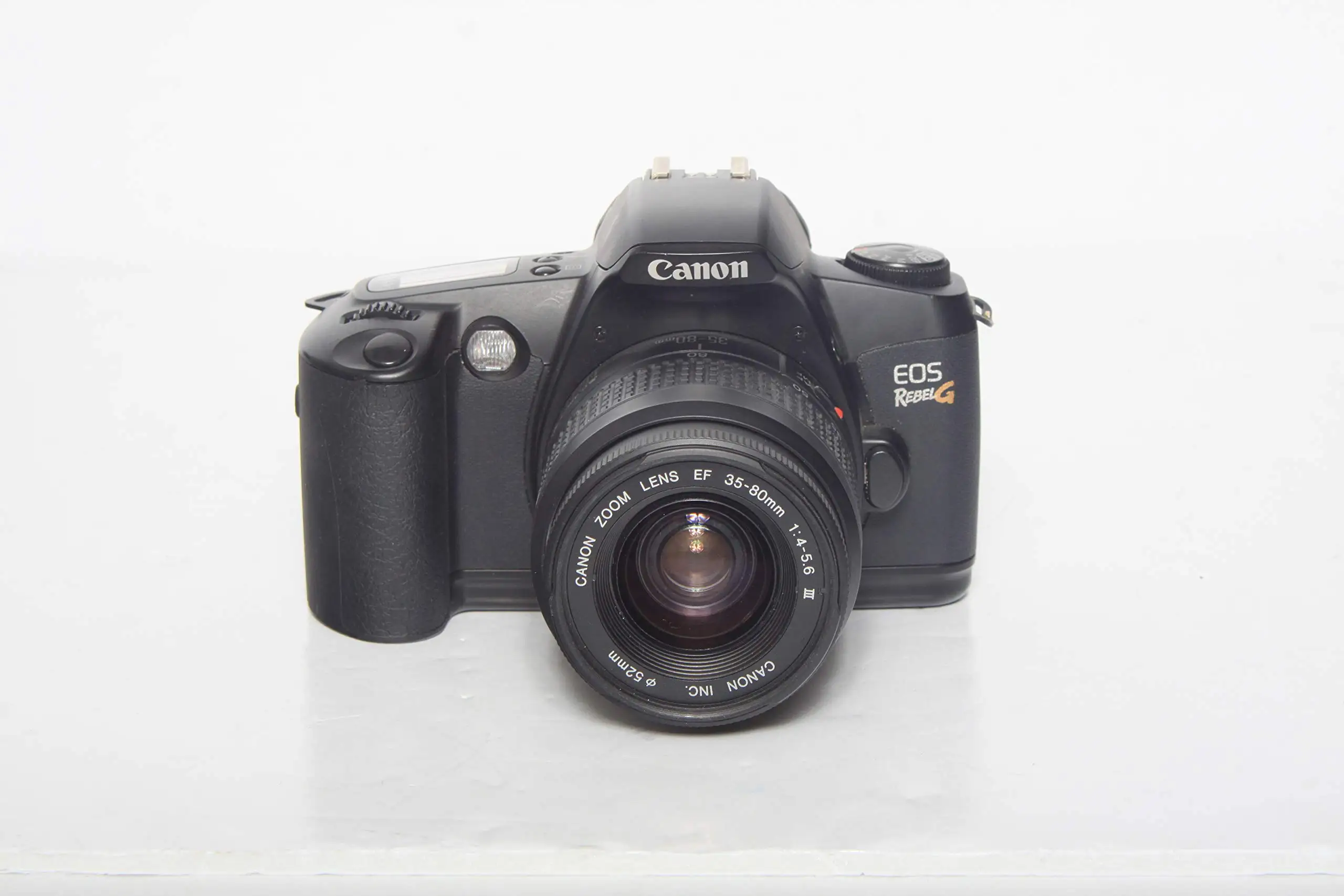 Canon EOS Rebel G showing grip and top LCD panel